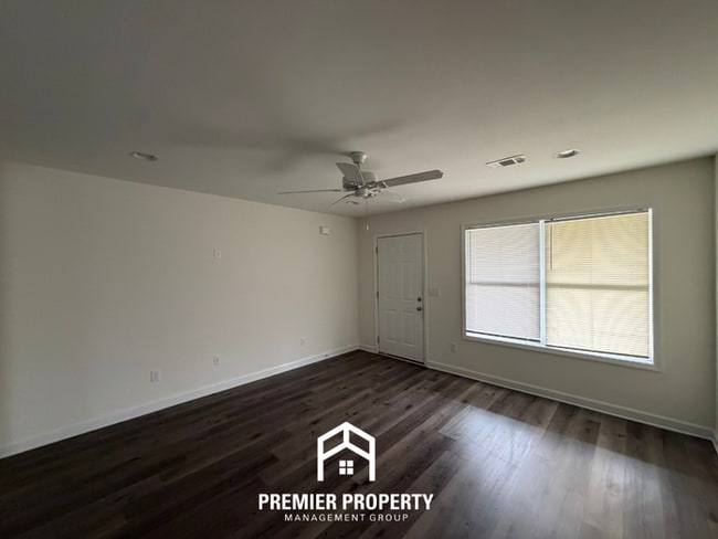Building Photo - Modern 4BR/2BA Tuscaloosa Home | Stainless Steel Appliances, Hardwood Floors & Covered Patio