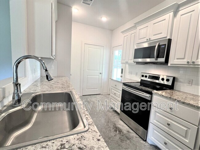 Foto del edificio - 7677 River Ridge Dr