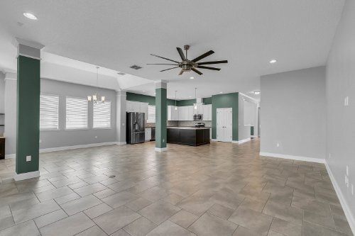 Great room / dining area. - 16413 Good Hearth Blvd