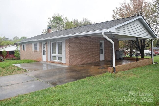 Building Photo - Home for Rent – Charming Mid-Century Brick...