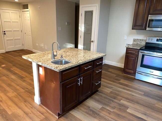Building Photo - Upgraded 2 bedroom condo in a gated commun...