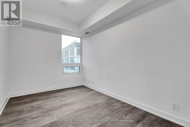 Building Photo - 108-5108 Peter St