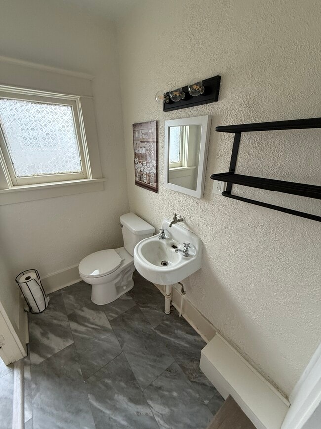 New floors in shared bathroom - 428 S Main St