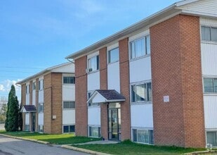 Building Photo - Hemlock Place Apartments