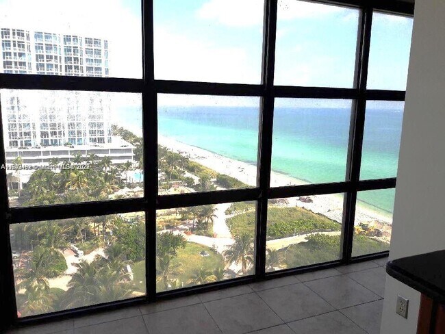 Building Photo - 6423 Collins Ave