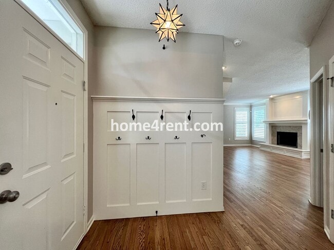 Building Photo - Updated Kitchen, Large Two Tiered Deck, Finished Basement in Blue Valley Schools!