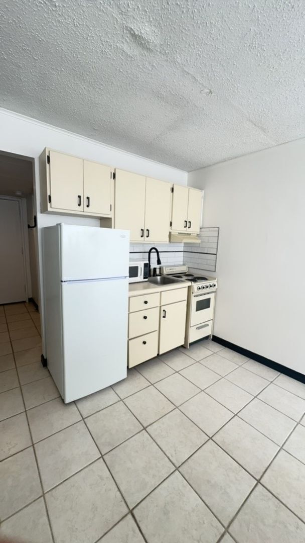 Building Photo - University Towers- Studio Apartment- Available for Fall 2025!