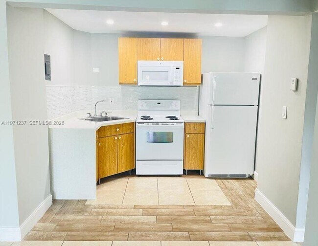 Building Photo - 4275 NW S Tamiami Canal Dr