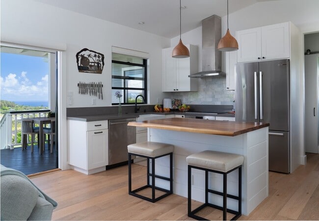 Building Photo - Elevated Haiku Retreat with Ocean Views, Designer Finishes & a Lush Edible Garden Sanctuary