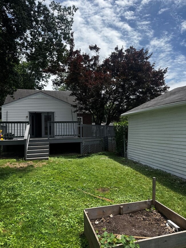 Photo - Fully Updated 3BR/2BA St. Matthews Cape Cod with Garage & Wrap-Around Deck House