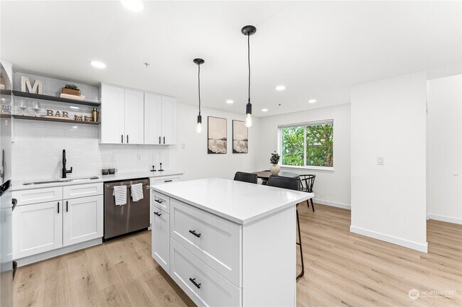 Open concept with kitchen island - 1001 W Casino Rd