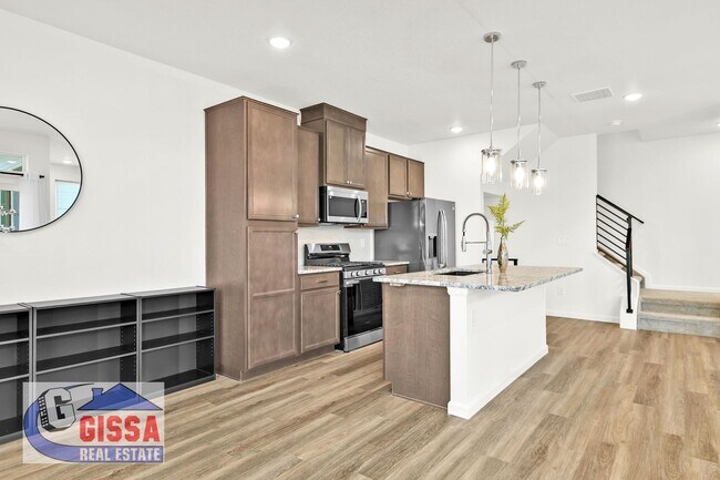 Foto del edificio - 1.5 year old townhome with 3 bedrooms, 2 1/2 bathrooms, 2-car garage at Victory Ridge available NOW!
