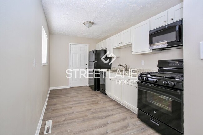 Building Photo - REDUCED! - Now offering $500 off first ful...