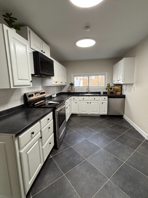 Foto del edificio - 1105-1107 Reynolds Rd