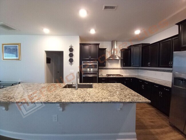 Building Photo - Gorgeous 4 Bedroom 3 Bathroom Home with 2 ...
