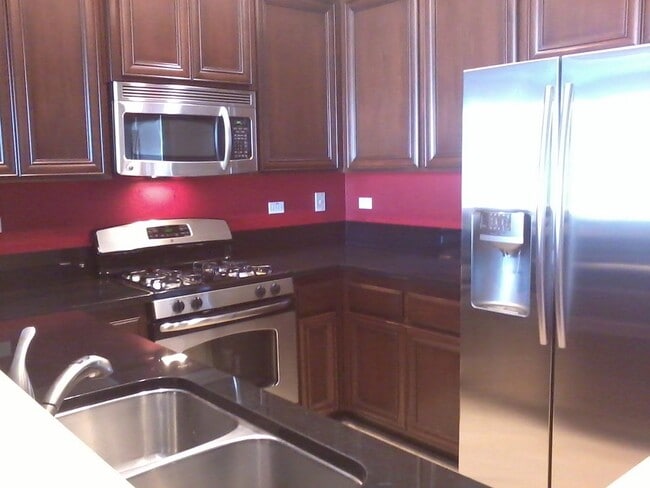 Building Photo - 6283 Lonetree Blvd