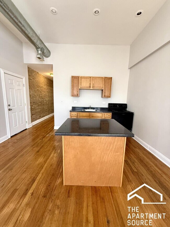 Foto del edificio - 6911 S Paxton Ave