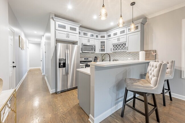 Foto del edificio - 4634 S Langley Ave