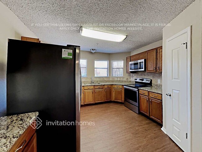 Foto del edificio - 8713 Wood Glen Dr