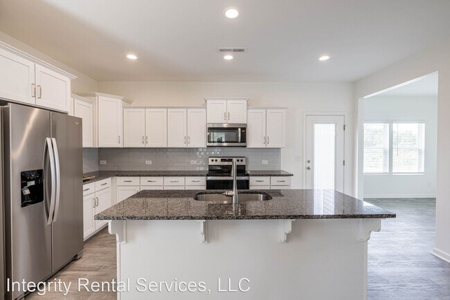 Building Photo - 4 br, 2.5 bath House - 317 Babbling Brook ...