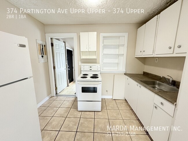 Building Photo - COZY 2 BED/1 BATH NEAR U OF W - INCLUSIVE!!