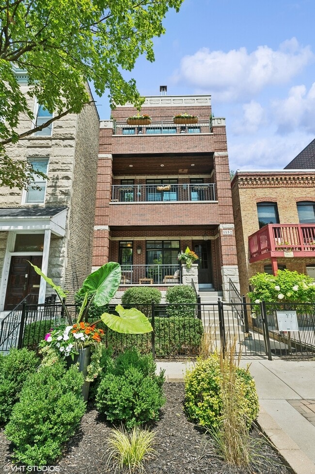 Building Photo - 1152 W Newport Ave