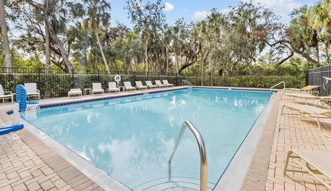 The pool is the perfect place to lay out to catch some Florida sunshine or take a dip to cool off. - 4408 Tuscan Loon Dr