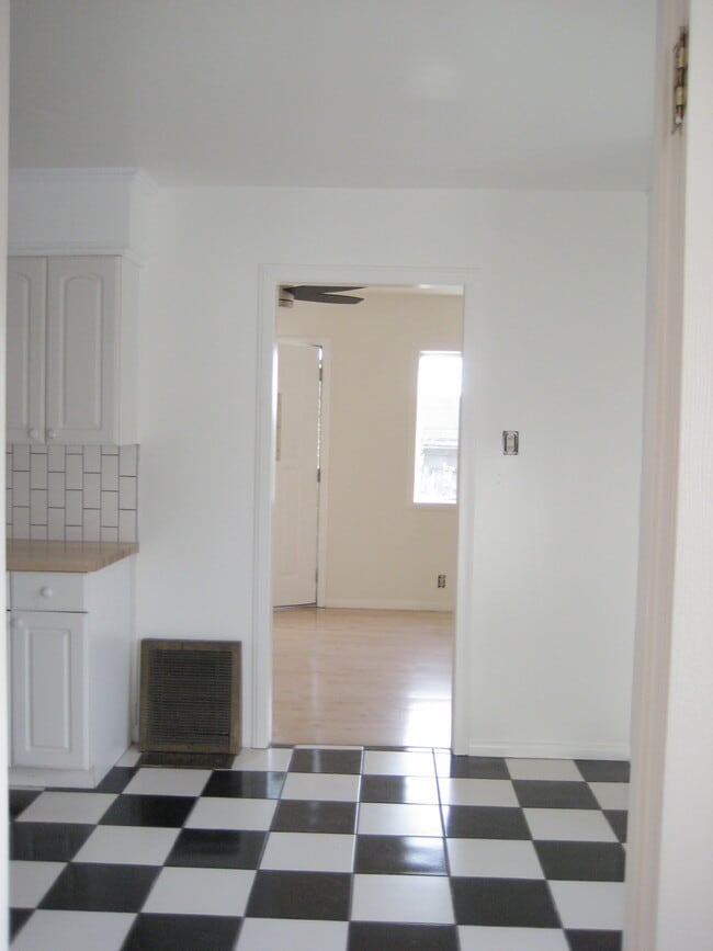 looking into the living room from the kitchen - 1579 Cerro Gordo St