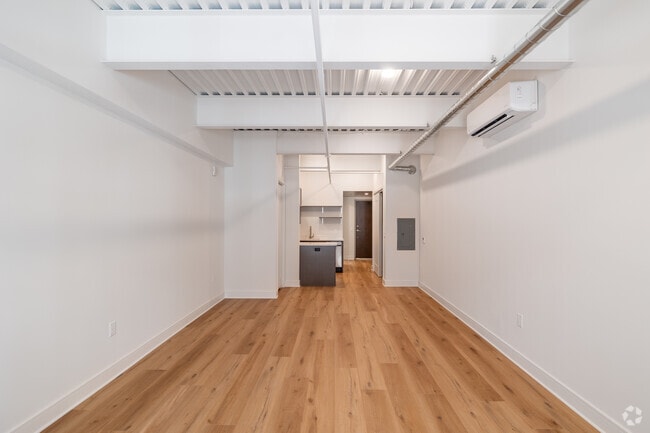 Studio - 555SF - Living Room - The Apartments at 101 North Queen