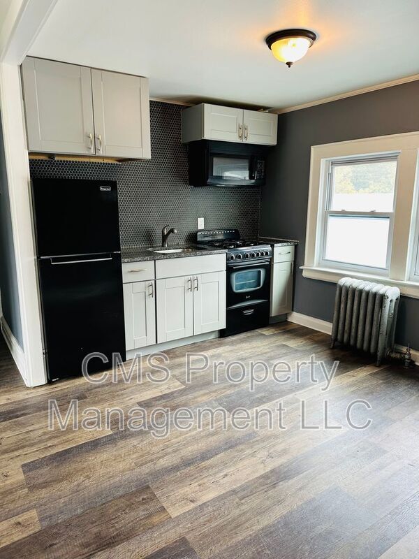 Photo - 301 E 9th Ave Apartment