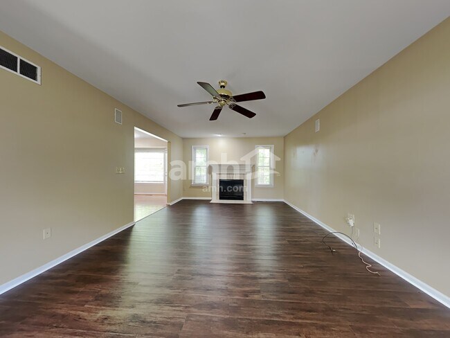 Building Photo - 15 Whispering Woods Lane