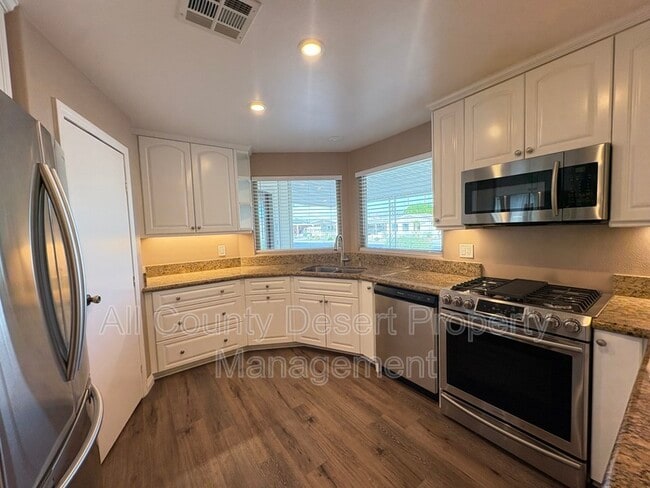 Building Photo - 38251 Desert Greens Dr E