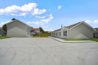 Building Photo - 2112 Multi National