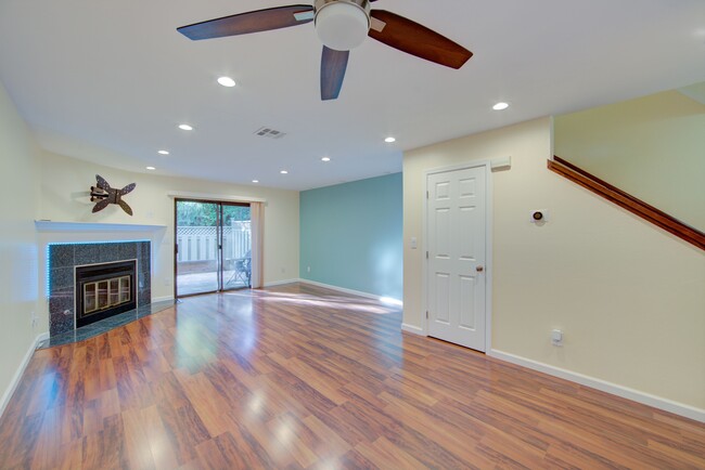 Living room, fireplace, sliding door to porch - 344 Eastgate Ln