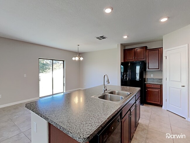 Foto del edificio - 10450 CARLOWAY HILLS DR, WIMAUMA, FL 33598