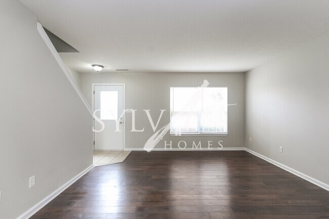 Foto del edificio - The living is easy in this lovely 3 bedroo...