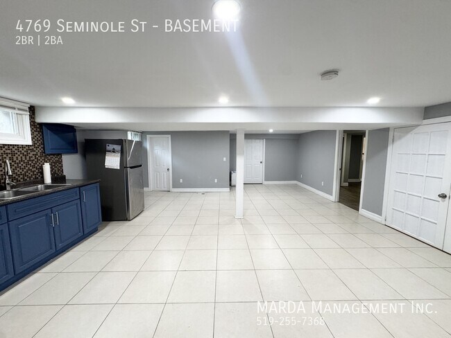 Photo du bâtiment - COZY 2 BED/2 BATH BASEMENT UNIT + 40% OF HYDRO, WATER & GAS