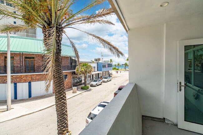 Building Photo - The Purple Pelican~Beachfront w/ Ocean Bal...