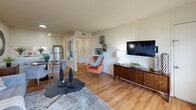 Located on Blacow Road in Fremont, California, this one-bedroom, one-bathroom unit offers a well-organized single-floor layout designed to maximize every square foot. Wood-style flooring runs throughout the main living areas, lending warmth and visual continuity across the space.

The living room serves as the central gathering area, featuring a large window that draws in natural light and provides an outdoor view. The open sightline toward the kitchen enhances the sense of spaciousness throughout the shared living zone.

The galley-style kitchen is efficiently configured with white cabinetry, light quartz-style countertops, and stainless steel appliances including a refrigerator, range with overhead microwave, and dishwasher. A skylight overhead adds an additional source of natural light to the cooking area.

The bedroom offers a comfortable layout with mirrored sliding closet doors that reflect light and expand the visual footprint of the room. A sliding glass door provides direct access to an outdoor area, bringing in natural light and outdoor views.

A hallway connects the main rooms and leads to the full bathroom, which features a tub-shower combination, a window for natural ventilation, and clean white finishes throughout. The overall ambiance of the unit is neutral, bright, and functional.