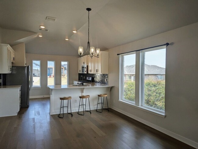 Building Photo - Spacious Yukon Home with Storm Shelter, 2-Car Garage & Fenced Yard!