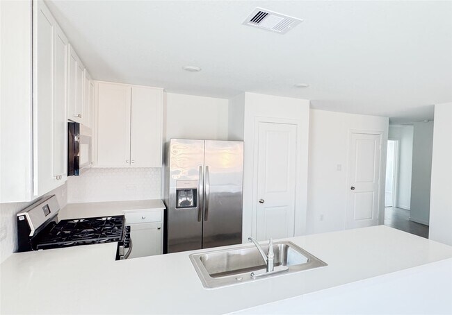 Foto del edificio - 6406 Begonia Trellis Dr