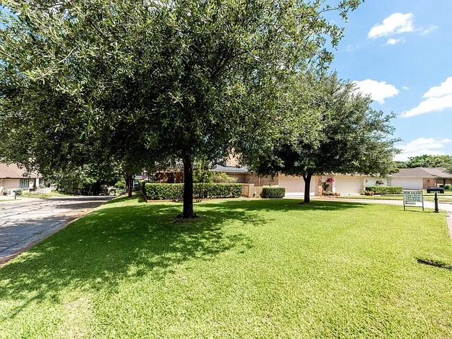 association maintains the yard and trees - 3708 Windmill Hill St