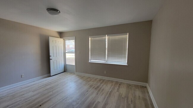 Building Photo - Brand Spanking New - Fresh Paint/New Floor...
