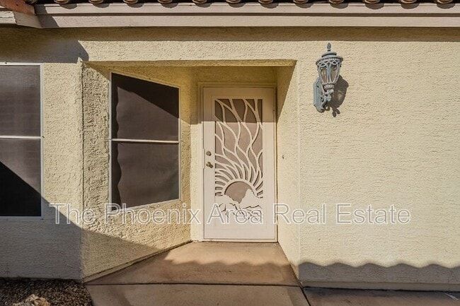 Building Photo - 1125 W Macaw Dr