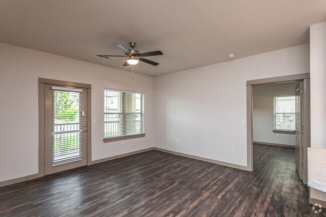 1BR, 1BA - 776SF Living Room - The Green Jay