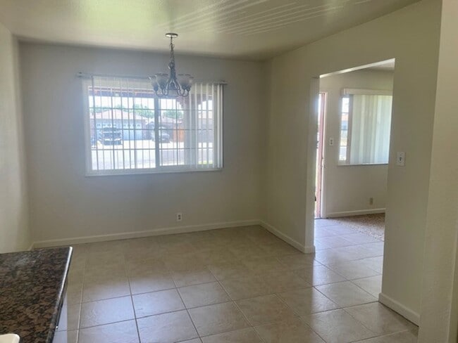 Building Photo - Charming house in an established quiet neighborhood in a court