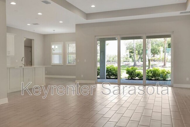 Building Photo - 6133 Lungo Lago Dr