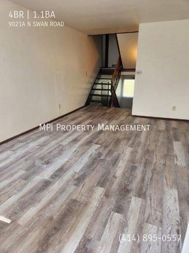 Building Photo - 9021 N Swan Rd