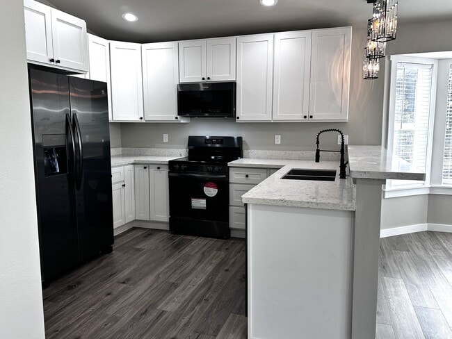 Building Photo - 207 S Razor Clam Dr SW
