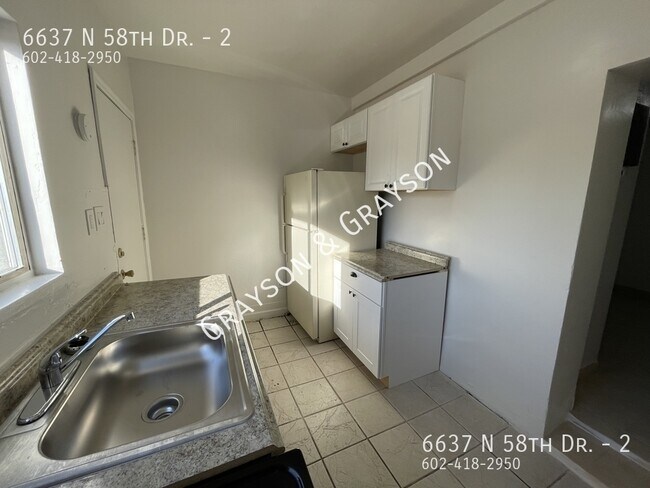 Foto del edificio - 6637 N 58th Dr
